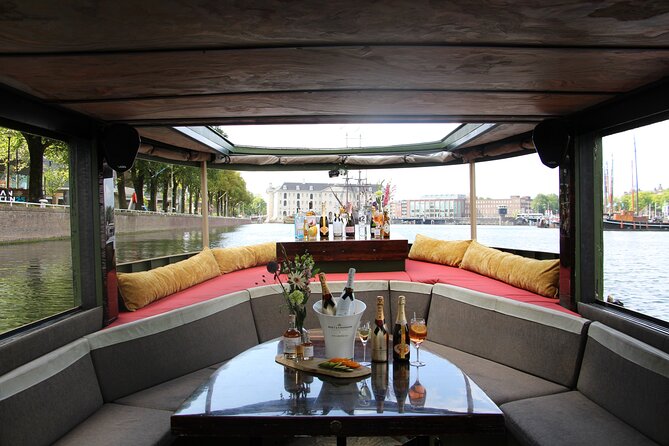 Amsterdam: Luxury Boat Cruise With Beers, Wines & Cocktails - Iconic Amsterdam Sights