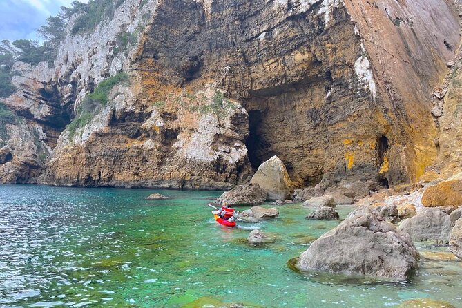 Kayak Paradise: Cala Portixol Snorkel, Cave & Cliff Jumping Tour - Experience Details