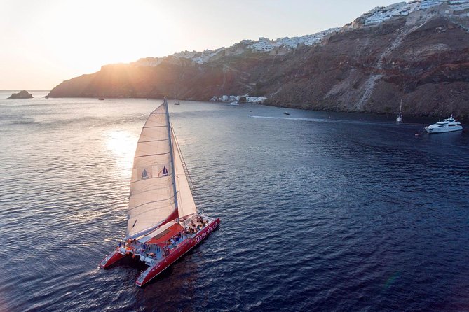 Sailing Catamaran Cruise in Santorini With Bbq, Drinks and Transfer - Breathtaking Views and Landmarks