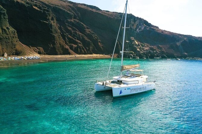 Private Sailing Catamaran in Santorini With BBQ Meal and Drinks - Swimming and Snorkeling Opportunities
