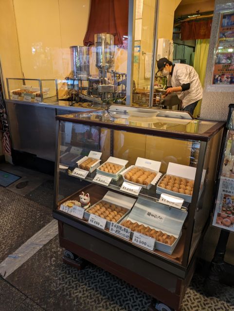 Tokyo Japanese Food Hopping Tour in Ueno Ameyoko at Night - Purchasing Japanese Souvenirs