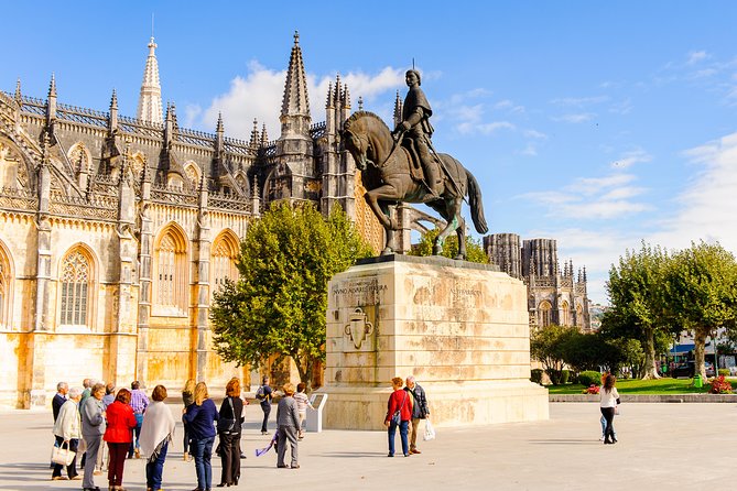 Fatima, Batalha, Nazare, Obidos Full-Day Group Tour From Lisbon - Pricing and Guarantee