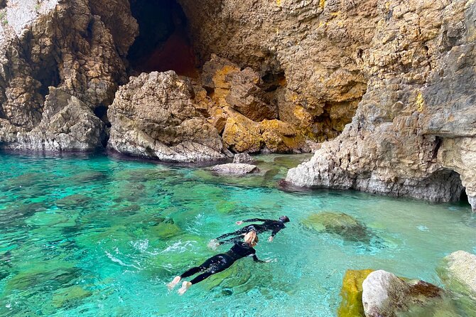 Kayak Paradise: Cala Portixol Snorkel, Cave & Cliff Jumping Tour - Panoramic Coastal Views