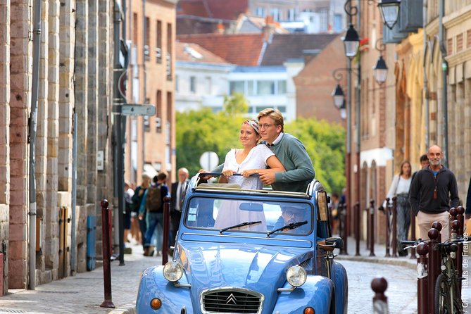Unique Tour of Lille by Convertible 2CV - 1h00 - Cancellation Policy