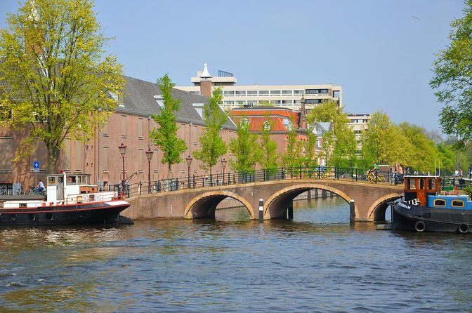 Amazing Open Boat Amsterdam Canal Cruise With Two Drinks Incl. - Key Points