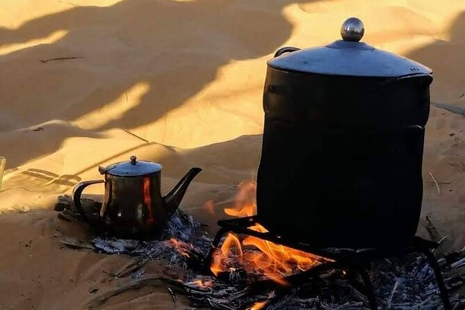 2 Days Tour to Douz & Ksar Ghilan Oasis. and an Overnight in the Sahara Under Bedouin Tent .. Dinner in the Camp, Private Jeep - With English Speaking Guide.