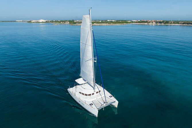 8-Hour Private 38 Catamaran 2-Stop Tour to Cozumel With Food,Open Bar & Snorkel