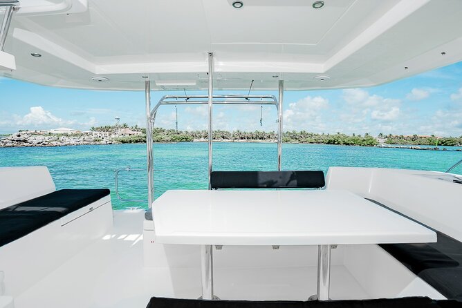 8-Hour Private 40 Catamaran 2Stop Tour to Cozumel Beach, Food, Drinks & Snorkel