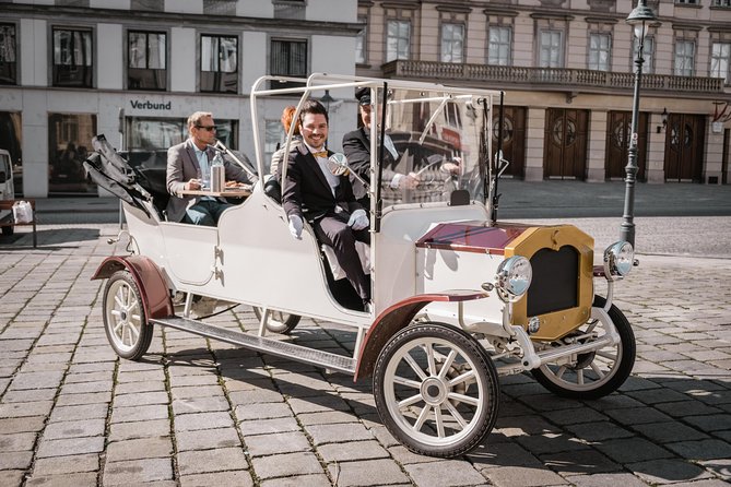 City Sightseeing Tour in an Electro Vintage Car (Up to 5 People)