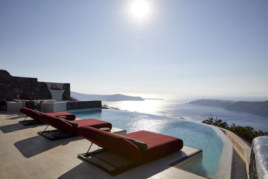 Daybed Relaxation With Infinity Pool Use With Caldera Views