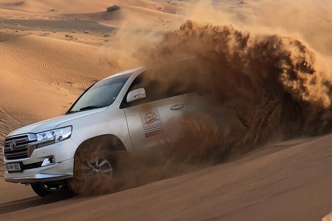 Dubai Evening Desert Safari With Camel Ride, Sand Boarding, BBQ & Entertainment