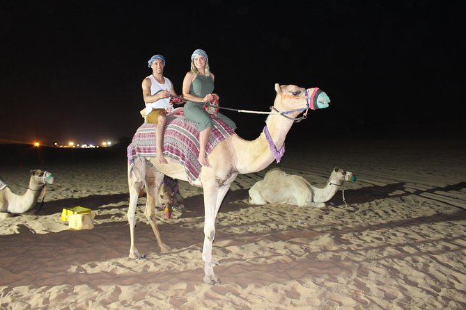 Evening Desert Safari on Red Dunes + Sandboarding + BBQ Dinner & Entertainment