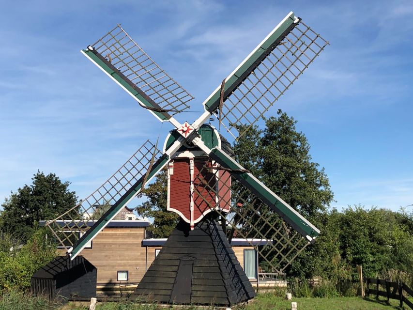 From Amsterdam: Guided Zaanse Schans & Zaandam E-Bike Tour - Itinerary Highlights