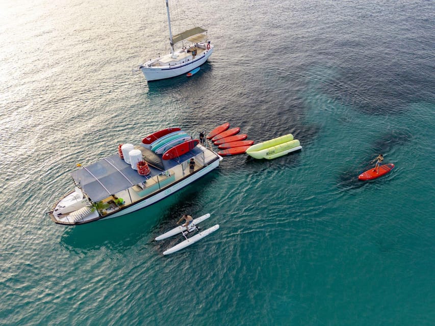 Ibiza by Sea: Coves, Caves, Water Sports & Open Bar - Activity Overview and Pricing