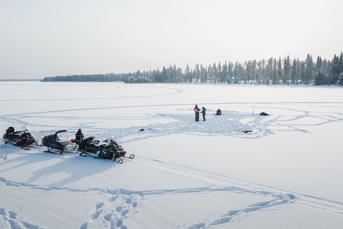 Ice Fishing and Snowmobile Safari Combo in Lapland