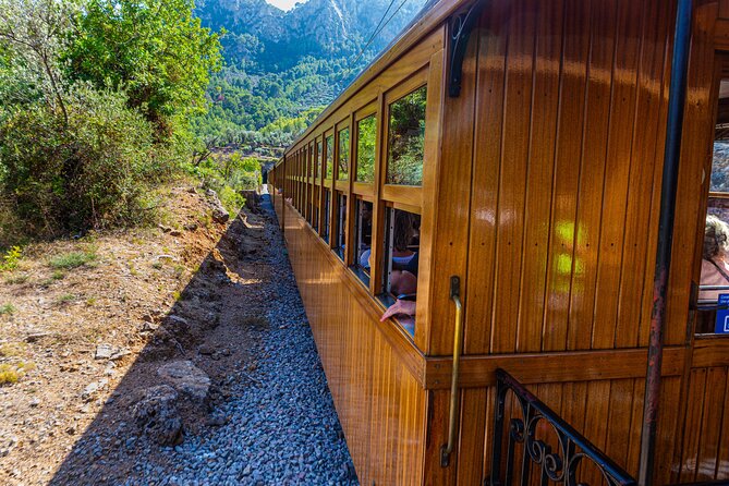 Mallorca in One Day Sightseeing Tour With Boat Ride and Vintage Train - Exploring the Serra De Tramuntana