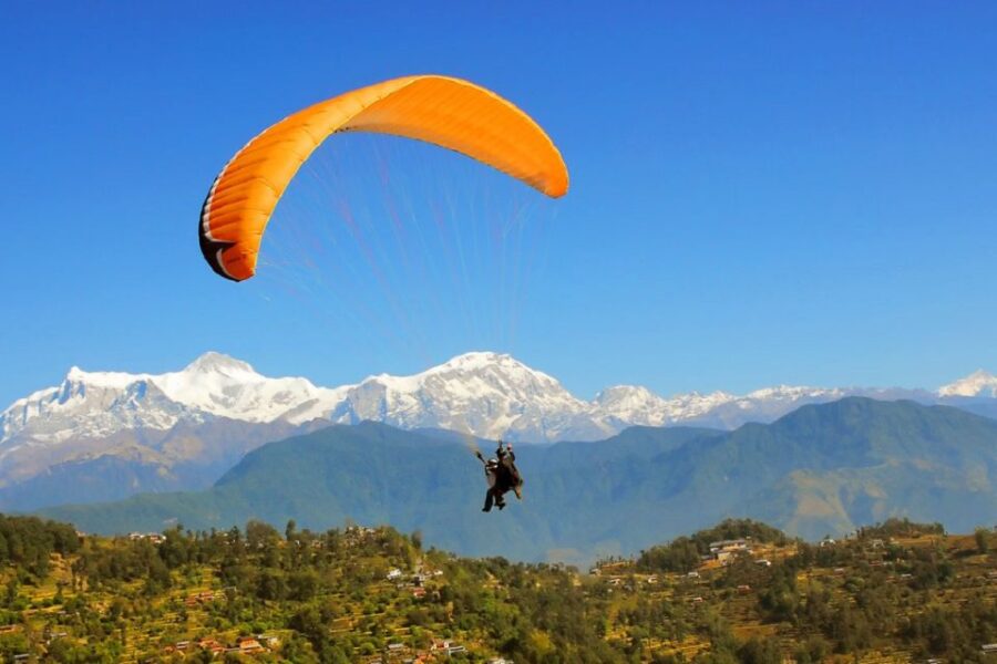 Pokhara Paragliding Adventure: Stunning Photos & Videos