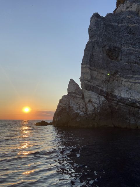 Sunset Boat Tour With Aperitivo & Swim in Natural Park