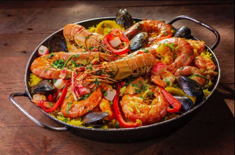 Tapas Tour Paella and Malaga Market With Official Guide - Overview of the Tour
