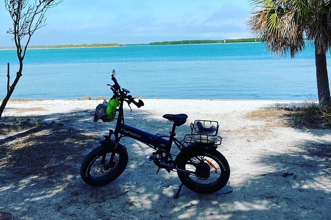 Treasure Island & Johns Pass Electric Bike Sunset Guided Ride - Tour Overview