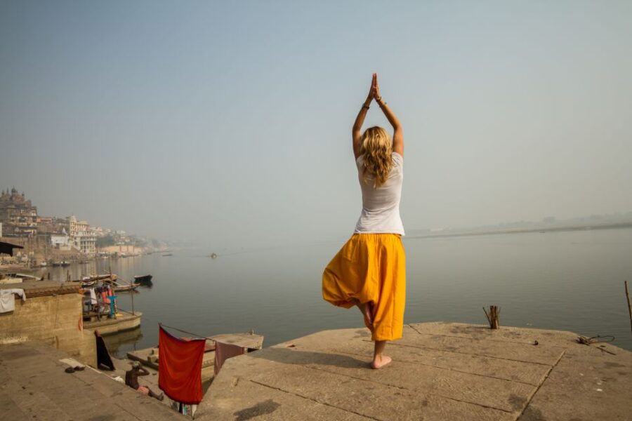 Varanasi: Morning Guided Boat Ride With Yoga