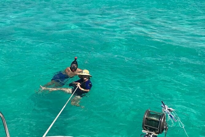 Catamaran to Isla Mujeres, Open Bar, Buffet, Beach Club Included - Meeting & Pickup
