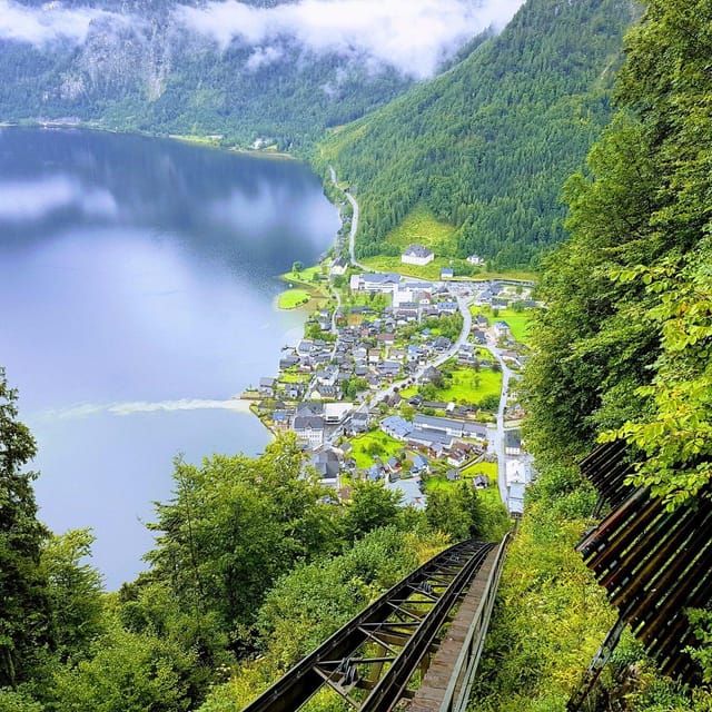 From Vienna: Day Tour to Hallstatt and Salzburg & Boat Ride - Experience Highlights
