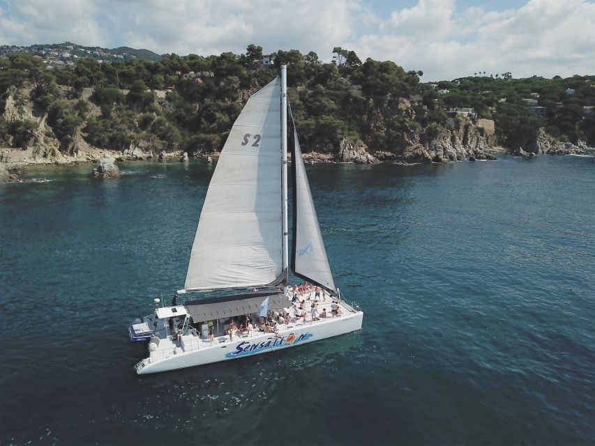 Lloret De Mar: Sunset Catamaran Cruise With DJ and Drinks - Highlights of the Experience