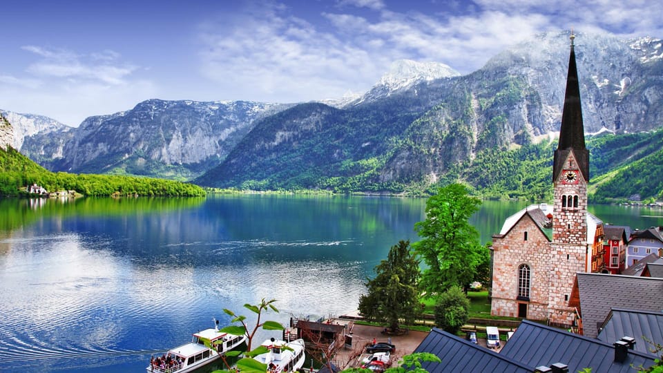 From Vienna: Day Tour to Hallstatt and Salzburg & Boat Ride - Scenic Boat Ride on Lake Hallstatt