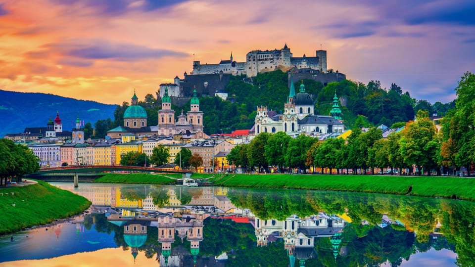From Vienna: Day Tour to Hallstatt and Salzburg & Boat Ride - Exclusive Guided Experience