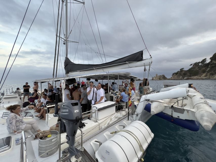 Lloret De Mar: Sunset Catamaran Cruise With DJ and Drinks - Panoramic Views of Costa Brava