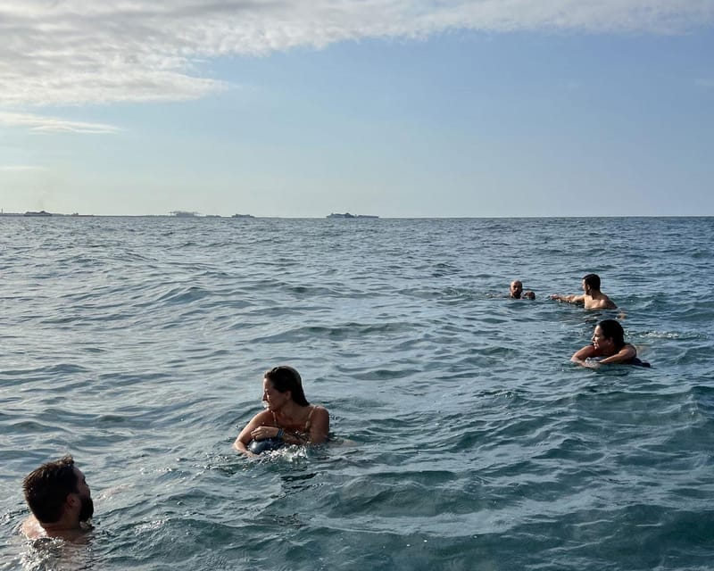 Barcelona: Coastline Sailing With Swim Toys W/ Food & Drinks