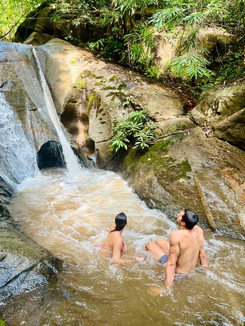 From Chiang Mai: Waterfall, Tubing, & Elephant Half-Day Tour