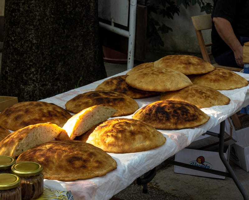 Local Market Zadvarje, Waterfall Gubavica and Three Lakes of Imotski Tour