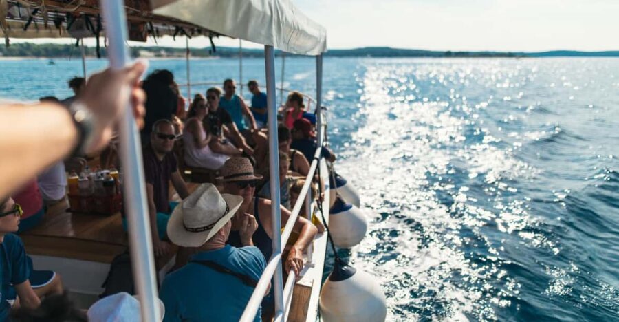 Rovinj: Sunset Cruise With Swim Stop, Drinks, and Fruits