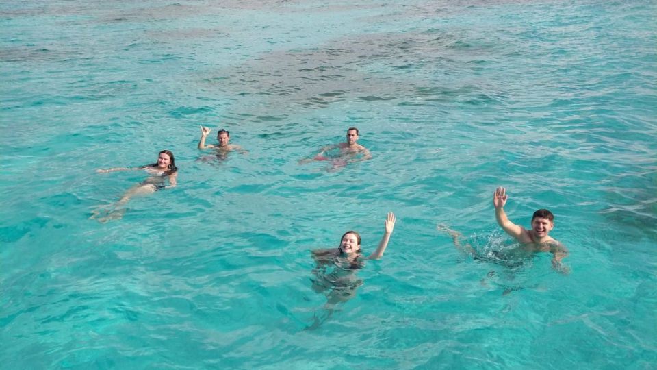 Isla Mujeres: Catamaran With Snorkel, Open Bar, and Transfer - Snorkeling Experience