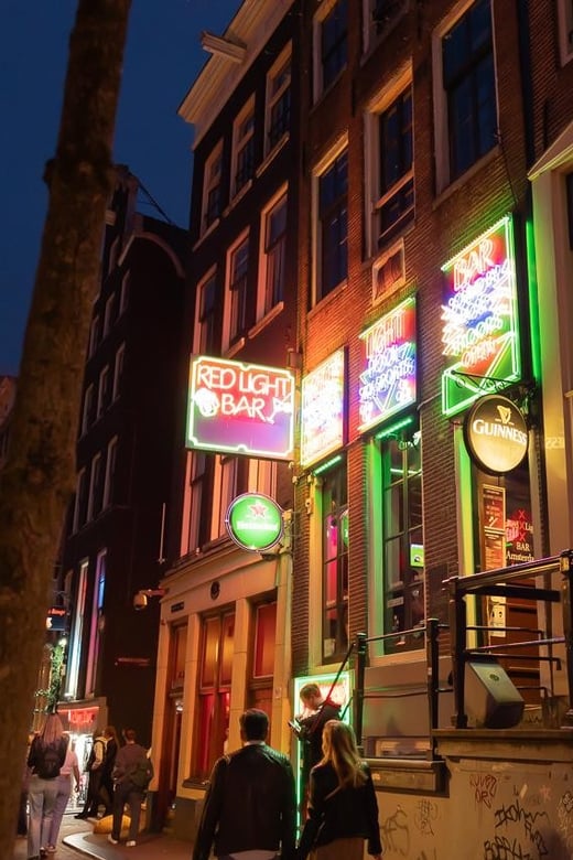 Amsterdam: Red Light Tour Exclusive and Peep Show - Key Points