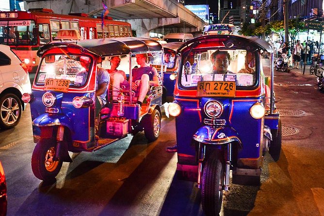 Bangkok Night Lights: Temple & City Tour by Tuk Tuk (SHA Plus)