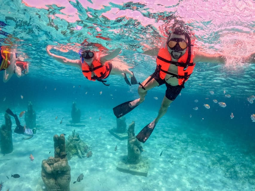 Cancun: Catamaran Trip to Isla Mujeres, Snorkel, & Open Bar
