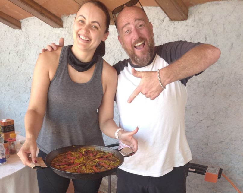From Sitges: Paella Masterclass With Drink and Bike Ride