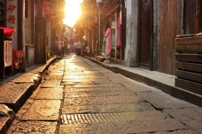 Private Fengjing and Xitang Water Town Sunset Boating Tour With Dinner From Shanghai
