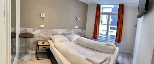 Hotel Damrak Inn - Room Types and Pricing