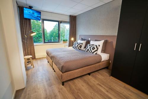 Amrâth Apart-Hotel Schiphol Badhoevedorp - Room Accommodations and Amenities