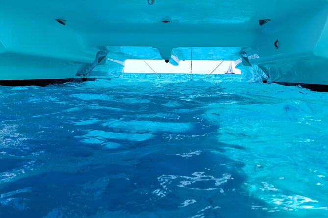 Catamaran From La Caletta - Sardinia - Capo Comino - Isola Rossa - Tour Overview