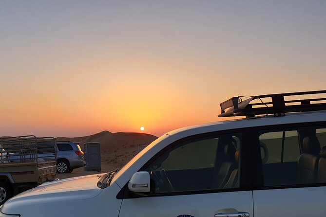 Dubai Evening Desert Safari With Quad Bike, Camel Ride and BBQ