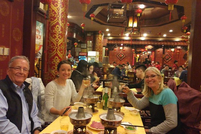 Mongolian Hot Pot Dinner Followed by Houhai Lake Visit and Foot Massage - Cooking the Hot Pot Meal