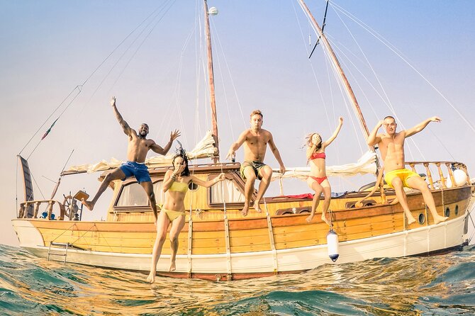 Private Day Trip to the Most Beautiful Beaches of Rhodes on a Traditional Boat - Overview of the Day Trip