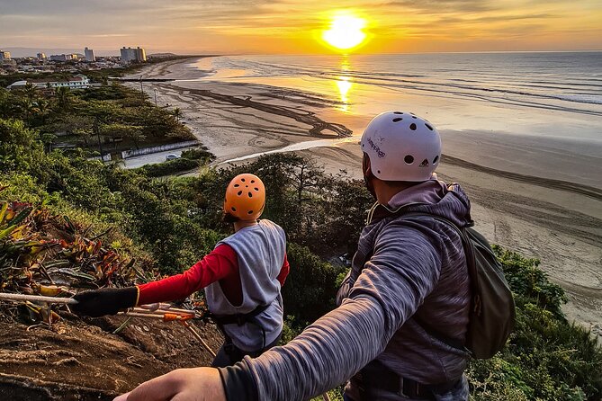 Rappelling at Costão Beach