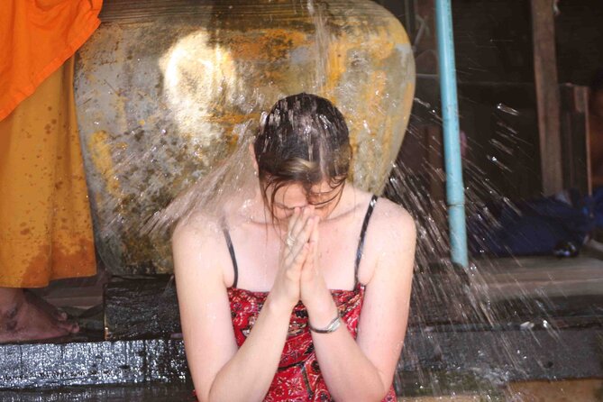 Traditional Buddhist Water Blessing at a Local Pagoda