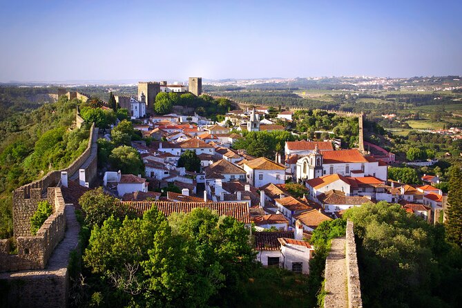 Transfer Tour Porto/Lisbon With 2 Stop Options Óbidos, Nazaré, Fátima, Coimbra